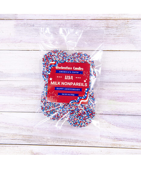 Pure, rich semi dark chocolate about the size and shape of a half-dollar, studded with Ravens Football colored candy seeds for that satisfying crunch in your mouth!