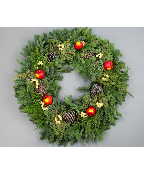 Welcome guests with timeless holiday charm with Season's Greetings Evergreen Wreath.