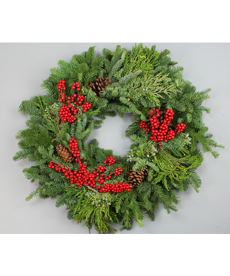Celebrate the season with our Christmas Traditions Wreath, a timeless blend of natural evergreens and festive accents. 
