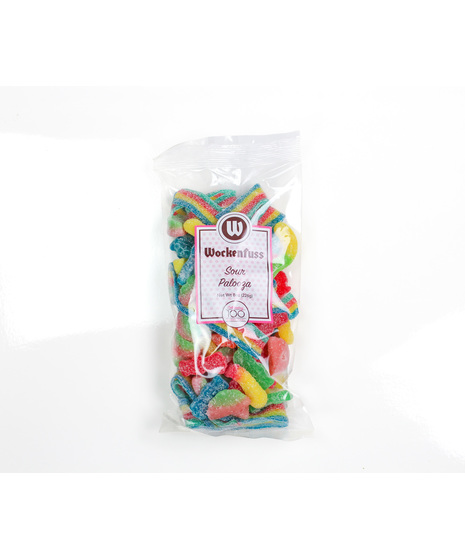 An assortment of your favorite sour candies – sour power belts, sour kids, sour watermelon and sour worms.