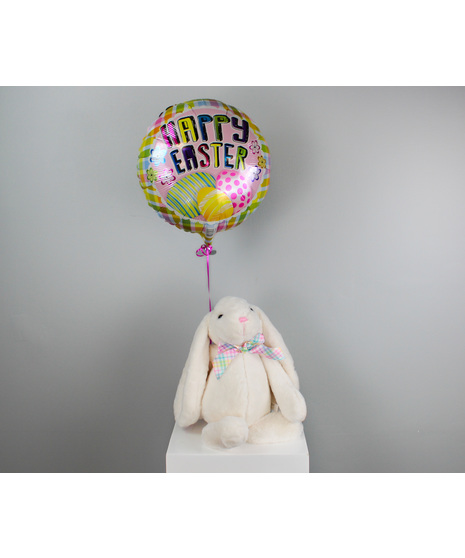 Celebrate the joy of spring with Egg Hunt, a charming Easter centerpiece bursting with soft pastels and playful detail.