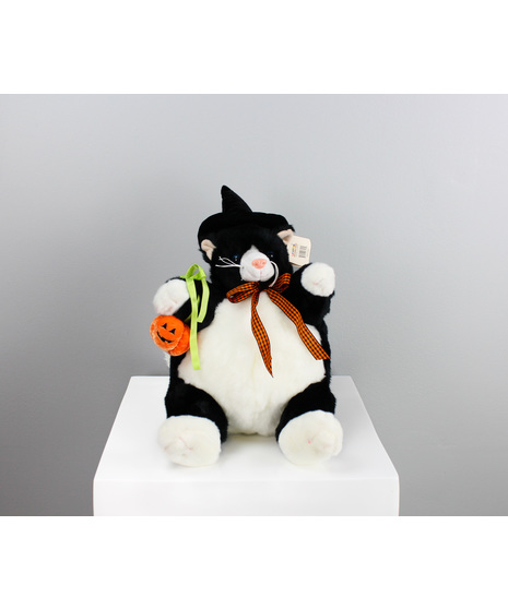 Whiskers the Witch Cat is a delightfully plump and charming plush ready to cast a spell of Halloween cheer! 