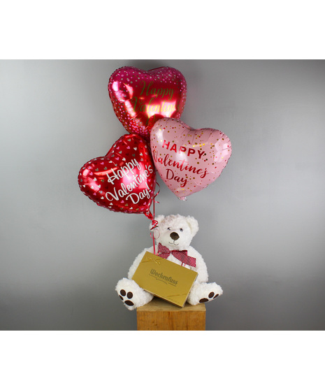 Dream Boat Valentine’s Day flower arrangement with pink hydrangea, Kahala roses, white anemones, ruby stock, hot pink lisianthus, peach ranunculus, and Israeli ruscus .