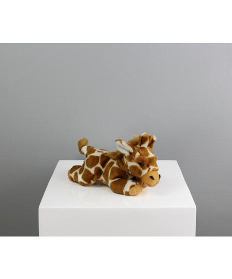 Greta the Giraffe is a sweet 8-inch plush friend, peacefully nestled in a cozy laying-down pose that’s perfect for snuggling or decorating your favorite spot.