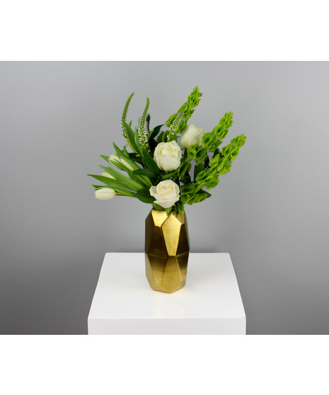 A radiant celebration of elegance and charm, this arrangement is housed in a sleek gold geometric vase, where modern design meets timeless beauty.