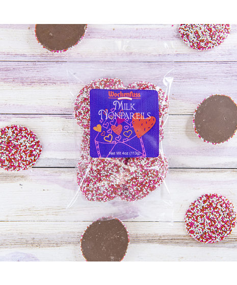 Pure, sweet milk chocolate about the size and shape of a half-dollar, studded with candy seeds for that satisfying crunch in your mouth!