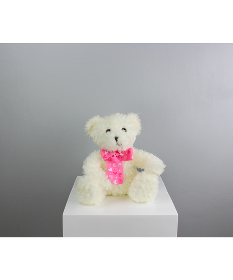 Lovey Bear is a soft, snowy-white teddy with the sweetest little smile and an irresistibly cuddly charm.
