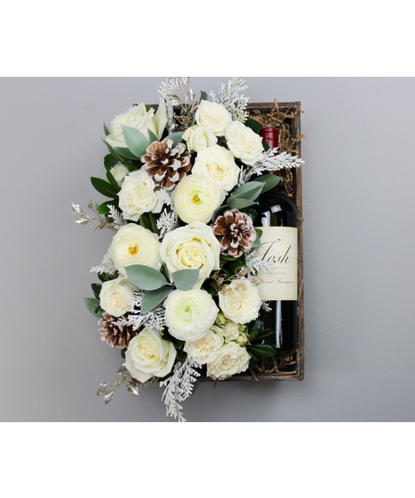 Indulge in the magic of the season with Winter Wine & Dine, an elegant gift crate that blends floral artistry with gourmet sophistication.